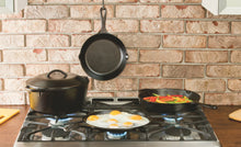 Load image into Gallery viewer, Lodge 10.5 Inch Cast Iron Griddle. Pre-Seasoned Round Cast Iron Pan Perfect for Pancakes, Pizzas, and Quesadillas. (5065330131075)
